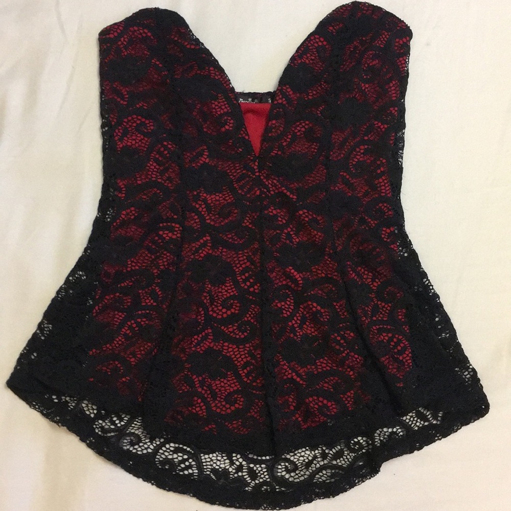 Lace layered, black and red strapless top.